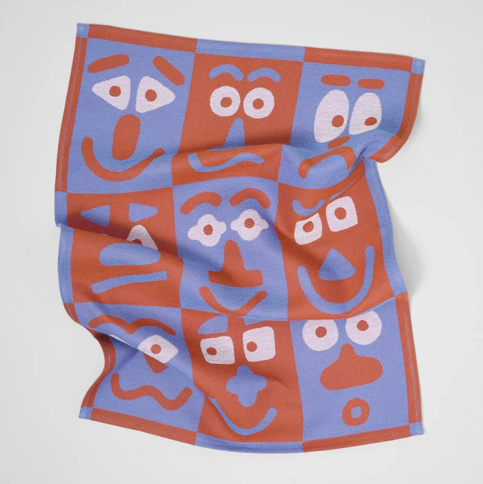 "MAKING FACES" TEA TOWEL — by Cari Vander Yacht